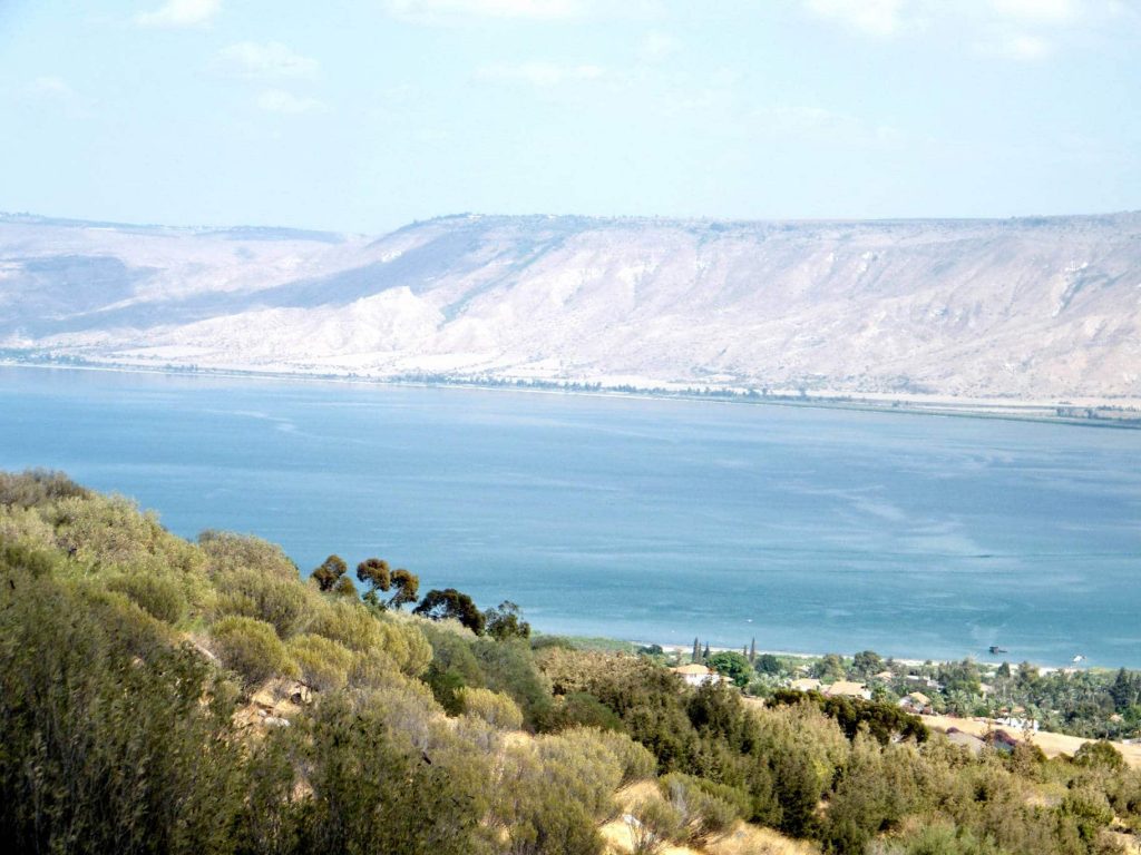 Blue Sea of ​​Galilee against the background of the Golan Heights in Israel